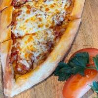 Pizza Margherita · Fresh tomato sauce, mozzarella, olive oil and sweet basil.