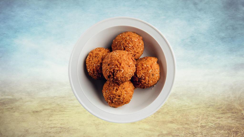 Falafel Appetizer · Our specially seasoned chickpeas and our selection of fresh vegetables are ground up to create six juicy balls, we then fry these balls until crisp on the outside to make it perfectly crunchy.