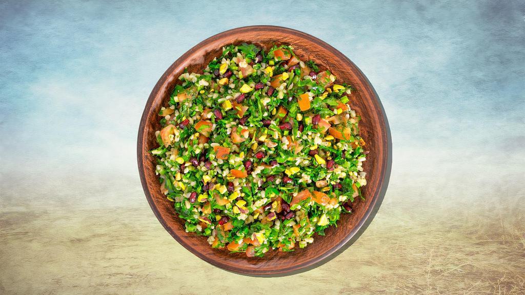 Tabouli Parsley Salad · Finely chopped parsley with tomatoes, onions, bulgur seasoned with olive oil, lime juice seasoned with salt and pepper to create our spin on this classic mix.