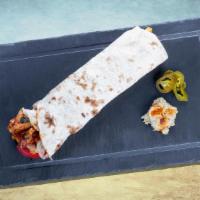 Chicken Wrap Sandwich Loco · First, our wrap is smothered in home-made hummus, topped with finely spiced chicken topped w...