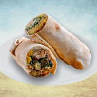 Shawarma & Falafel Wrap Sandwich · Patrons can enjoy the best of both worlds with this combination of shredded spiced chicken t...