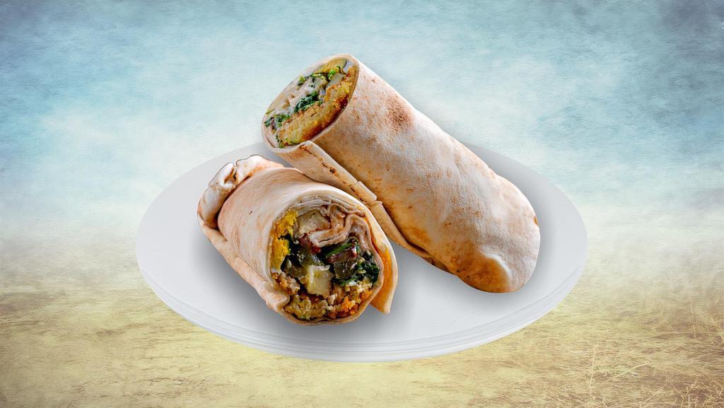 Shawarma & Falafel Wrap Sandwich · Patrons can enjoy the best of both worlds with this combination of shredded spiced chicken topped with falafels to create a roll enjoyed by all.