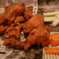 Wings · Eight to an order. Served with bleu cheese, carrots, and celery.