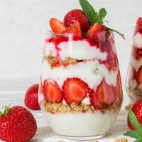 The Skinny Parfait · Creamy, thick Greek yogurt generously topped with strawberries, blueberries, mango, almonds ...