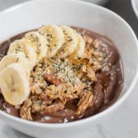 Chelsea Bowl · Smooth, nutrient dense, açaí blended and topped with bananas, strawberries, cacao nibs, bee ...