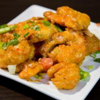 Thai Shrimp · Bite size shrimps tossed in our signature sriracha thai sauce