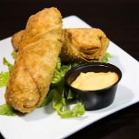 Cheese Steak Egg Rolls · Cheese steak sauted with onions, peppers & mushrooms stuffed into an eggroll and fried to pe...