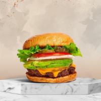 Bravo Avocado Burger · American beef patty topped with avocado, melted cheese, lettuce, tomato, onion, and pickles....