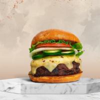 Jala-Jala Burger · American beef patty topped with melted cheese, jalapenos, lettuce, tomato, onion, and pickle...