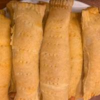 Flavorful Homemade Cheese Roll · Flavorful Cheese Roll made straight out of our kitchen! Filled with pungent cheese encompass...