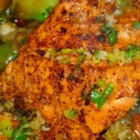 Flavorful Salmon · Served with rice, cabbage, and plantains or mixed vegetables. Salmon styles include - grille...