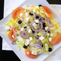 Small Tossed Salad · Lettuce, tomatoes, onions, black olives, fresh mozzarella and a side dressing.