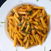 Pasta With Vodka Sauce · Served with choice of side and garlic bread.