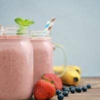 Strawberry, Blueberry, Banana And Apple Smoothie · Refreshing smoothie with strawberries, blueberries, bananas and apples.