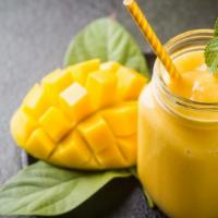 Ohh Mango Smoothie · Refreshing smoothie with mango, strawberry, mango juice, and raw agave.