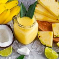 Piña Colada Smoothie · Refreshing smoothie with pineapple, coconut, banana, raw agave, and organic coconut water.