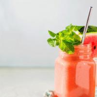 Summer Cool Smoothie · Refreshing smoothie with watermelon, peach, strawberry, raw agave, and organic coconut water.