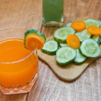 Carrot, Spinach And Cucumber Juice · Freshly squeezed juice trio.