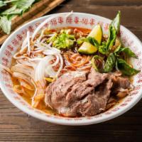 Spicy Beef Pho Noodle Soup · Spicy. Choice of beef. Served with spicy beef broth soup, onion, scallion, lemon, basil, and...