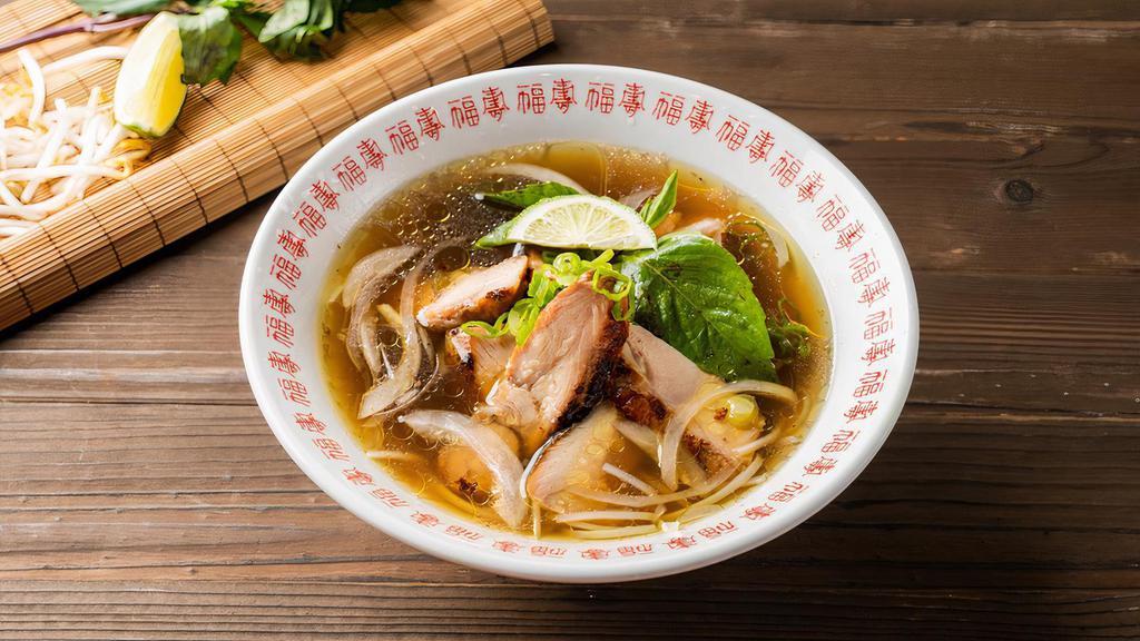 Chicken Pho Noodle Soup · Grilled chicken. Served with chicken broth soup, onion, scallion, lemon, basil, and bean sprout on the side.