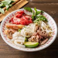House Pho Noodle Soup / 经典火车头 1 · Comes with Rare Eye Roud, Brisket, Tripe and Tendon, with rice noodles, served with beef bro...
