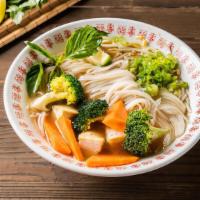 Vegetarian Pho Noodle Soup · Vegetarian. Mixed vegetable. Served with vegetarian broth soup, onion, scallion, lemon, basi...