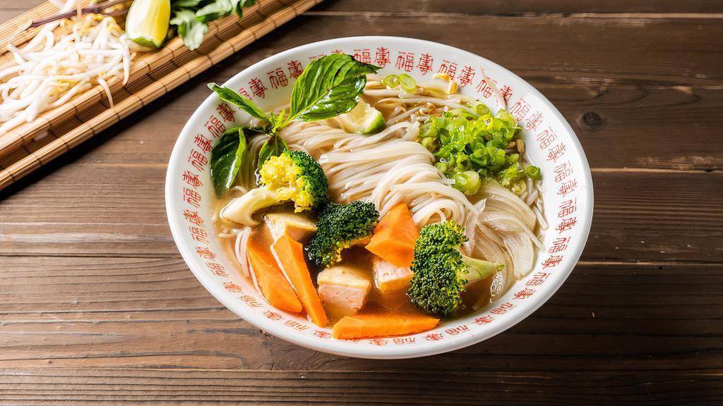 Vegetarian Pho Noodle Soup · Vegetarian. Mixed vegetable. Served with vegetarian broth soup, onion, scallion, lemon, basil, and bean sprout on the side.
