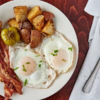 Big Breakfast Platter · 2 eggs any style with Bacon or Sausage or Ham & home fries and buttered toast.