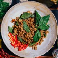 Minced Pork Holy Basil Stir Fry · The dish found on every street corner in Bangkok. Sweet and spicy stir fry of minced pork lo...