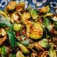 Holy Basil Brussels · A brussely variation on the dish found on every street corner in Bangkok. Sweet and spicy st...