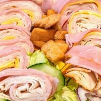 Chef Salad Large · Lettuce, tomatoes, onions, peppers, cucumber, croutons, Deli ham and Deli turkey.