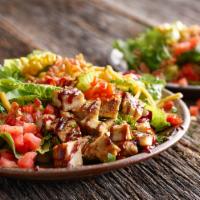 Bbq Chicken Cobb Salad · Cheddar cheese, corn, crispy bacon, tomatoes, roasted red peppers, BBQ ranch dressing, and a...