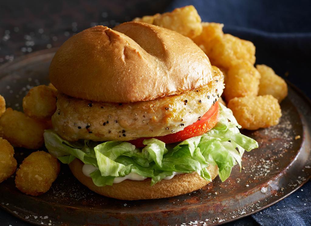 Grilled Chicken Sandwich · Grilled chicken breast with lettuce, tomato, and mayo.