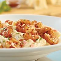 Parmesan Shrimp Pasta · We recommend these flavorful favorites any day. Spicy sautéed shrimp over penne pasta in Par...