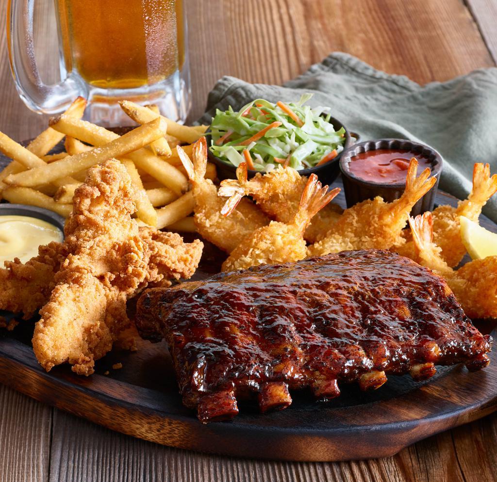 Triple Play · Four crispy jumbo shrimp, two hand-breaded buttermilk chicken tenders and a half-rack of our barbecue ribs make the ultimate feast. Served with two sides. 1020 cal.