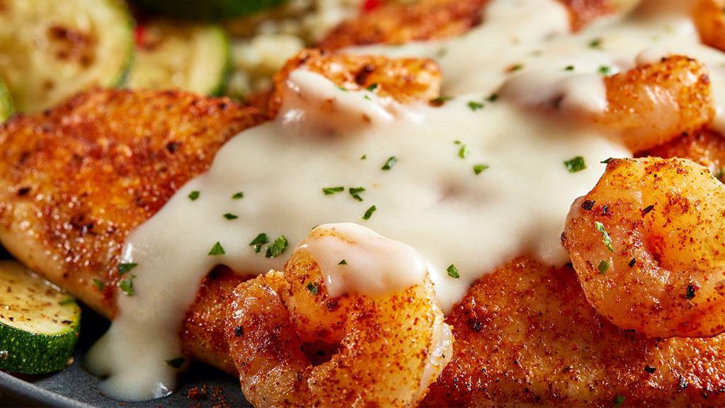 New Orleans Seafood · We recommend these flavorful favorites any day. Mild and flaky tilapia, creole-seasoned then topped with sautéed shrimp and Parmesan cream. Served with your choice of two sides. 320 cal.