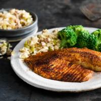 Blackened Tilapia · Fit and trim items are under 700 calories. Served with grilled zucchini and rice. Seasoned w...