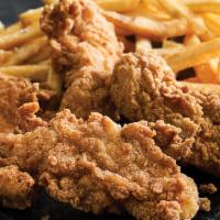 Chicken Tenders · Double-dipped in our signature buttermilk batter and fried to a crisp golden brown. Served w...