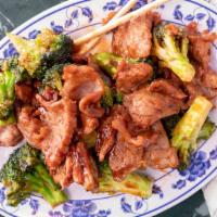 Beef With Broccoli / 芥兰牛 · With white rice.
