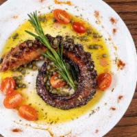 Grilled Octopus · Octopus leg chargrilled to perfection with olive oil and vinegar.