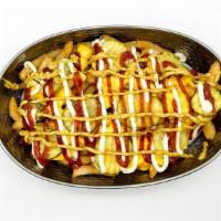 Signature Fries · Ketchup, mayo, mustard, pickles and cheese sauce