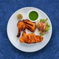 Bayside Tandoori Chicken · Chicken legs are marinated in Indian spices and cooked in a traditional tandoori oven. Serve...