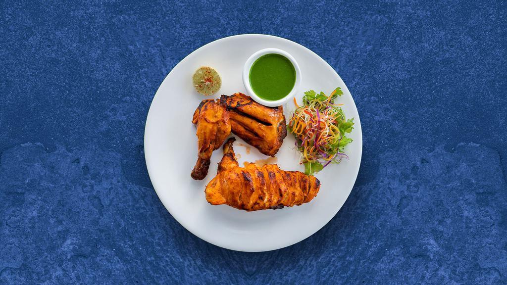 Bayside Tandoori Chicken · Chicken legs are marinated in Indian spices and cooked in a traditional tandoori oven. Served with fresh mint relish.