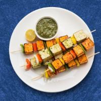 Crafted Cottage Cheese · Cottage cheese, marinated with spices with green peppers, mushroom, onions cooked in tandoor...