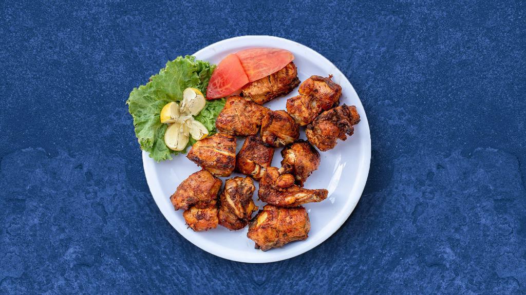 Chicken Tikka Town · Chicken marinated in herbs and spices barbecued in a clay oven on a skewer. Served with fresh mint relish.