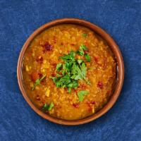 Lucid Yellow Lentil · 24 oz. Cumin and garlic tempered yellow lentils with onion and tomatoes. Served with a side ...