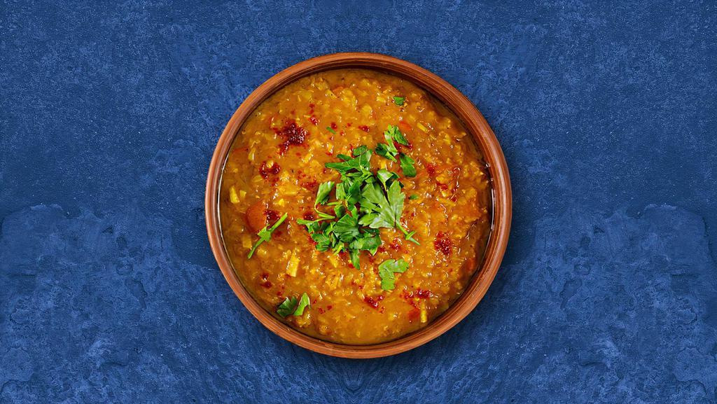 Lucid Yellow Lentil · 24 oz. Cumin and garlic tempered yellow lentils with onion and tomatoes. Served with a side of our aromatic Basmati Rice.