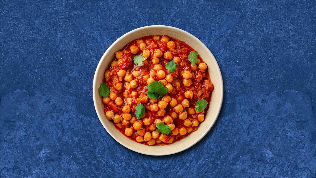 Champion Chickpea · 24 oz. Gently cooked chickpeas sautéed in a curry with a special blend of herbs and spices. Served with a side of our aromatic Basmati Rice.