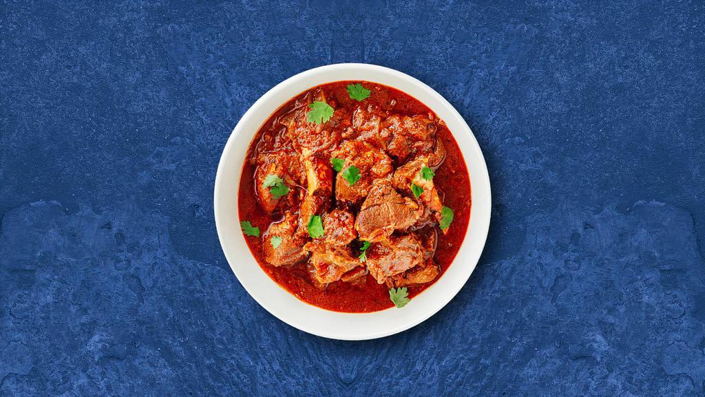 Clubhouse Lamb Curry · 24 oz. Chunks of lamb are prepared with special sauce from fresh onions, garlic, and spices. Served with a side of our aromatic Basmati Rice.