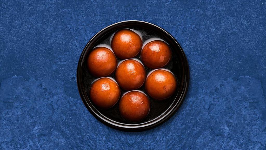 Dumpling Desire · 3 pieces. Village cheese balls dipped in a sugar-based cardamom flavored syrup.